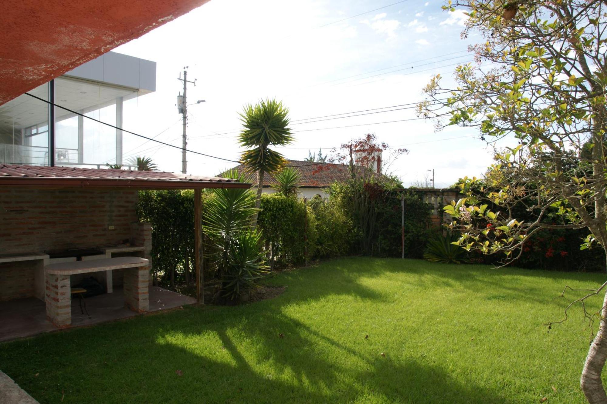 Hostal El Parque Tababela Rum bild